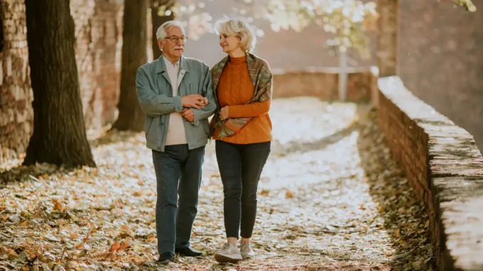 senior_couple_walking_iStock-1353800032