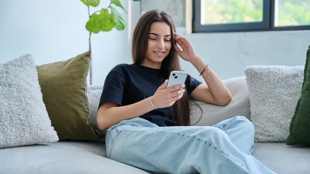 teen_phone_shutterstock_2696474823